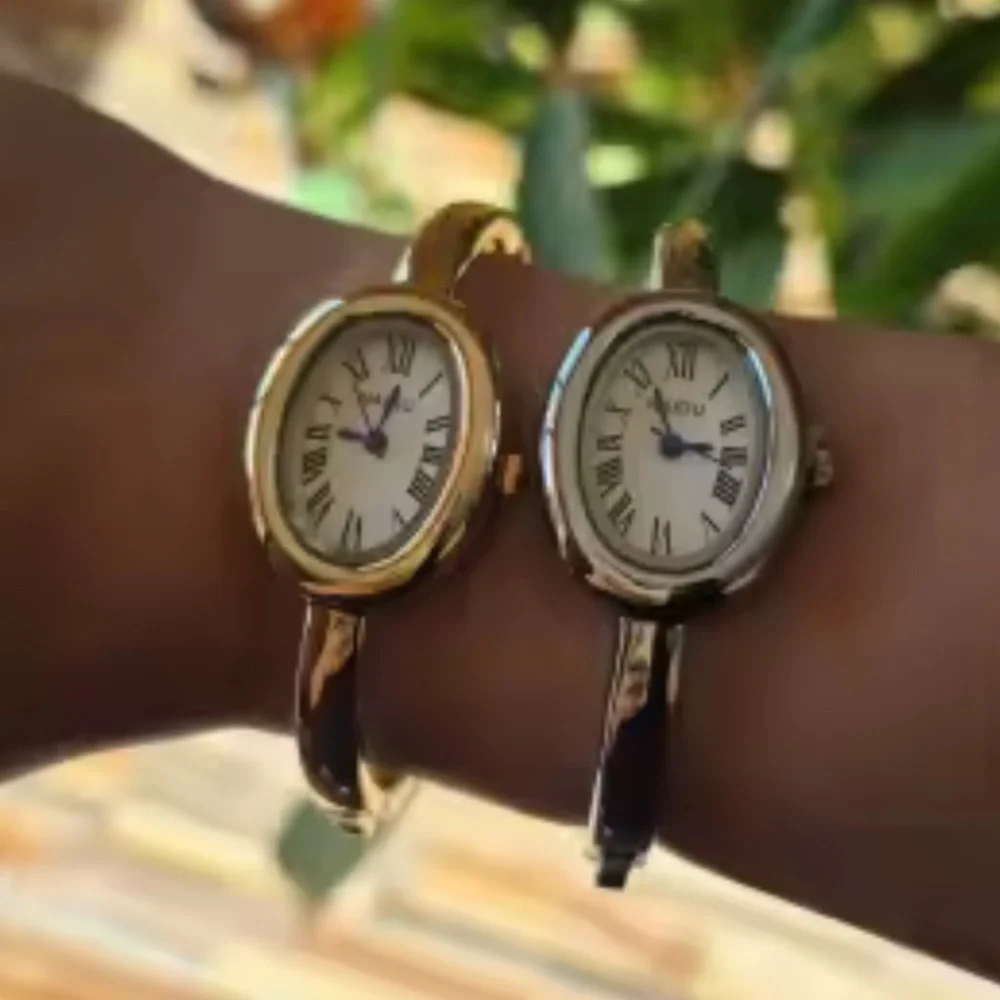 Anthropologie Gold Oval Bangle Watch with White Dial